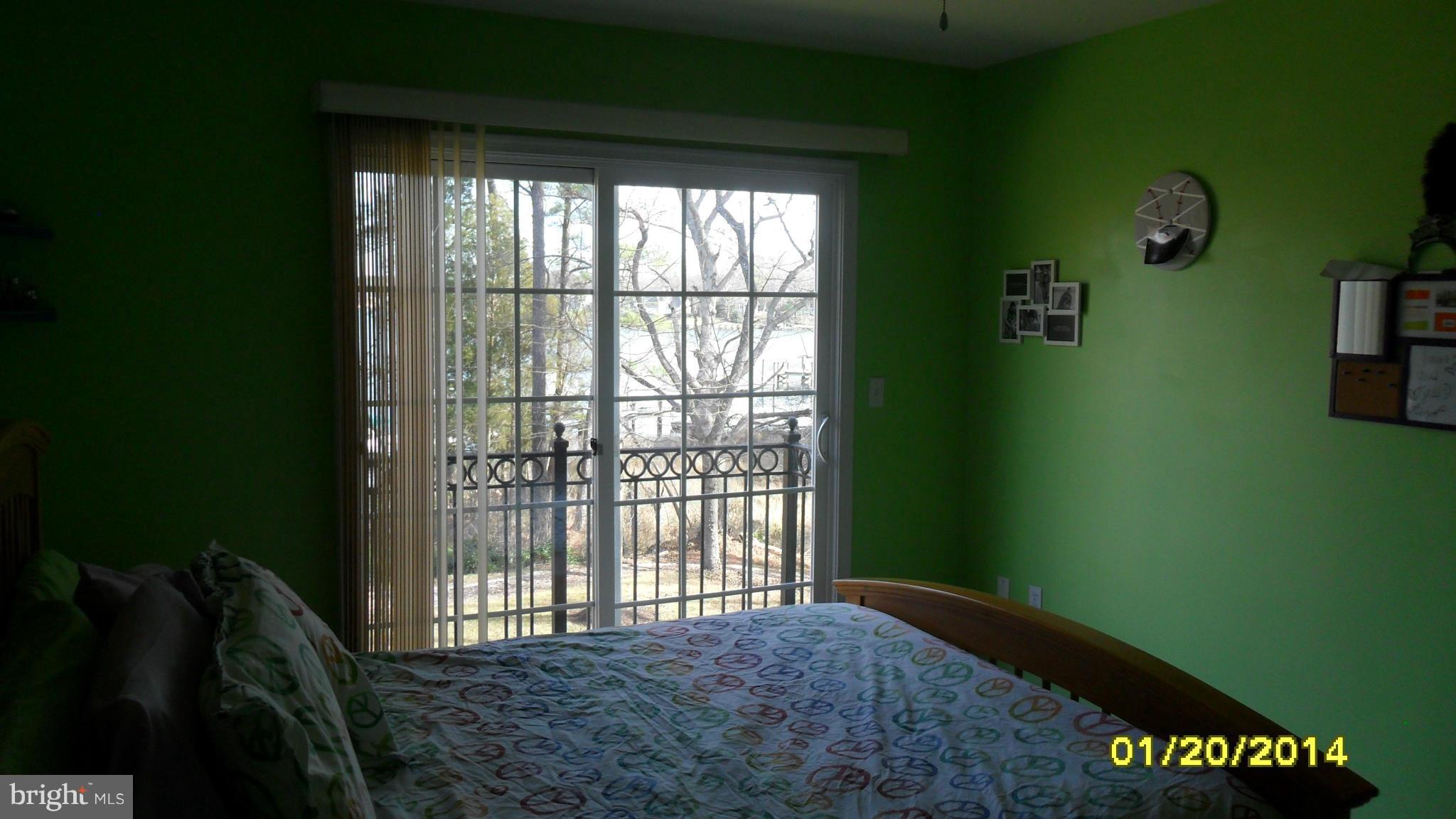 14232 Foxhall Road, Unit 17 Dowell, MD 20629 - Photo 5 of 11 a view of a front door
