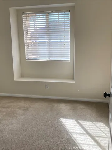 a view of a small space with a window