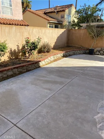 a view of swimming pool with outdoor space and lake view
