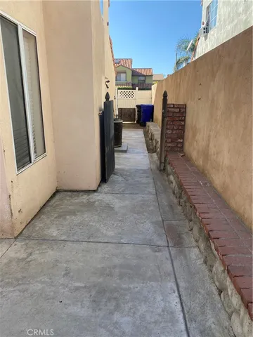 a view of a truck parked in back yard of a building