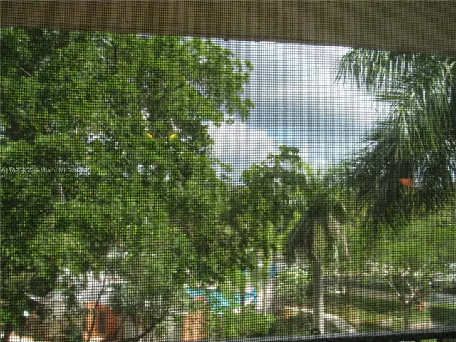 a view of a lake from a balcony