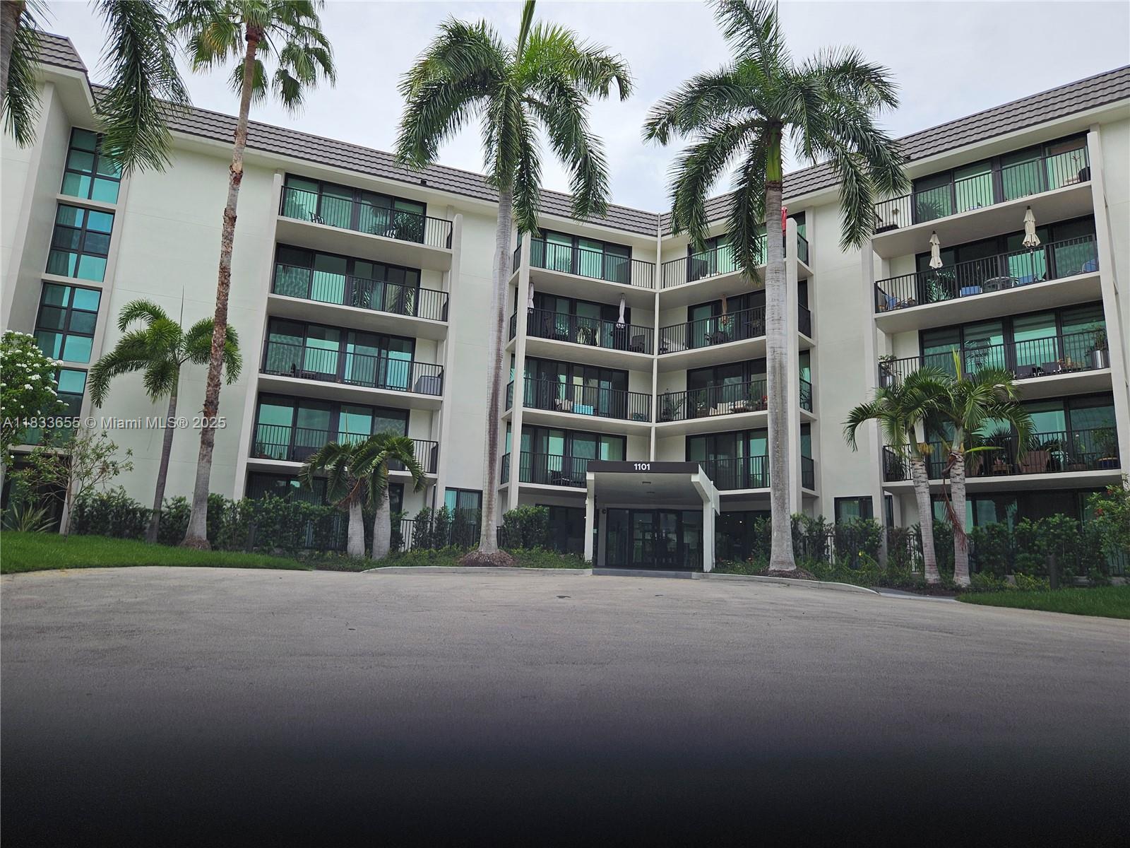 1101 River Reach Drive, Unit 418 Fort Lauderdale, FL 33315 - Photo 2 of 54 a house view with a garden