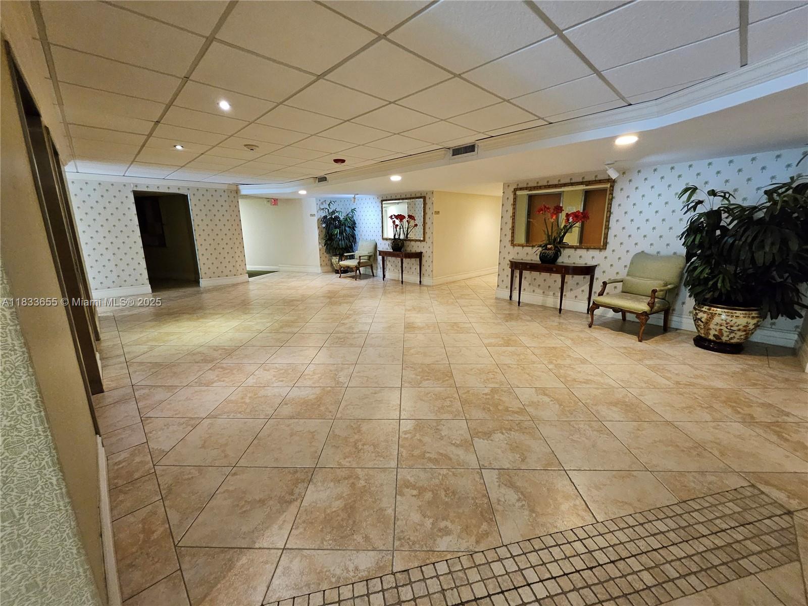 1101 River Reach Drive, Unit 418 Fort Lauderdale, FL 33315 - Photo 47 of 54 a view of a livingroom with furniture and a flat screen tv