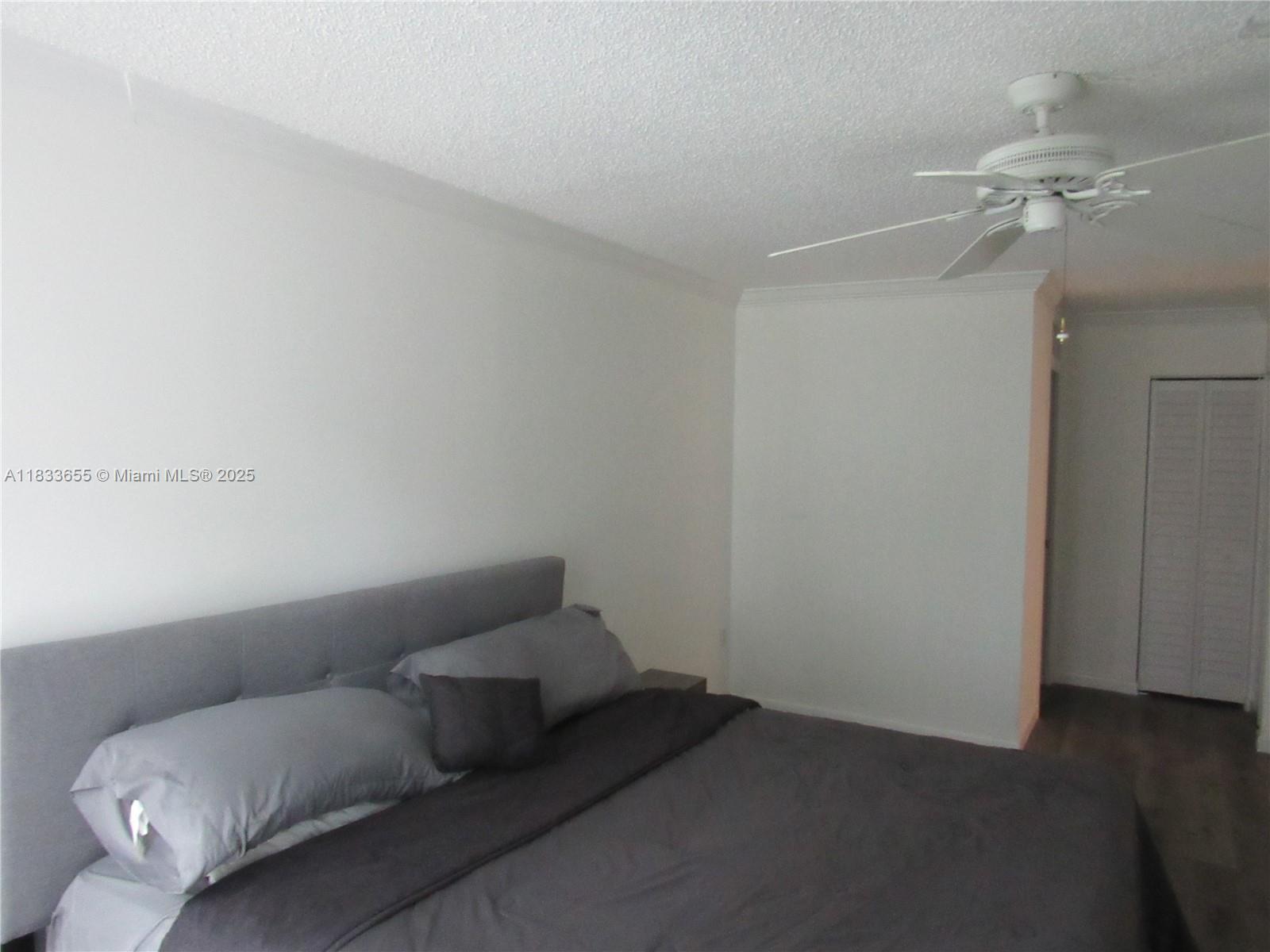 1101 River Reach Drive, Unit 418 Fort Lauderdale, FL 33315 - Photo 10 of 54 a living room with furniture and a ceiling fan