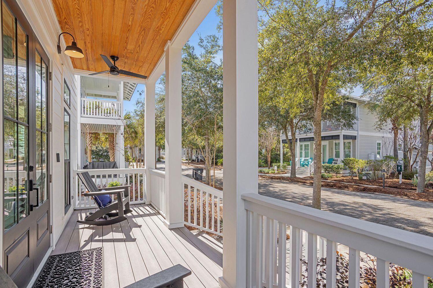 28 Hiker Street Santa Rosa Beach, FL 32459 - Photo 12 of 55 a view of a brick house with large windows and furniture