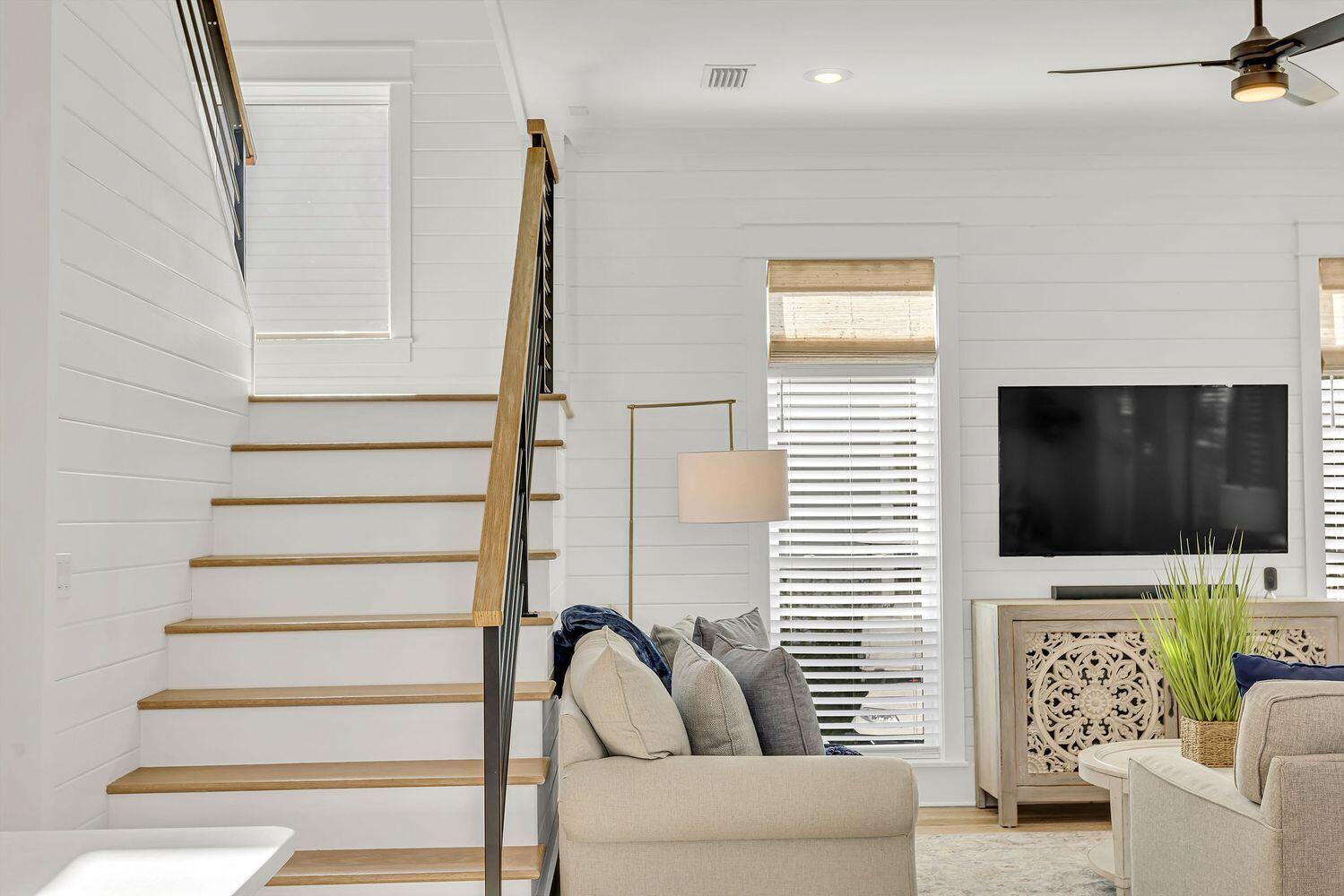 28 Hiker Street Santa Rosa Beach, FL 32459 - Photo 26 of 55 a view of a livingroom with furniture and staircase
