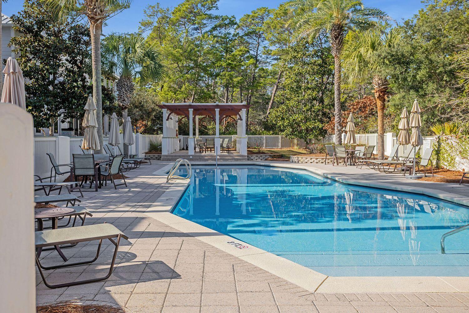 28 Hiker Street Santa Rosa Beach, FL 32459 - Photo 46 of 55 a view of backyard with swimming pool and seating space