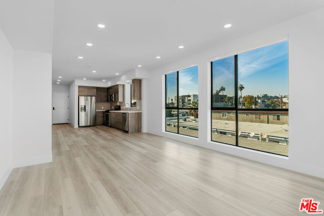 3632 Keystone Avenue, Unit 302 Los Angeles, CA 90034 - Photo 27 of 38 a view of kitchen with stainless steel appliances refrigerator oven