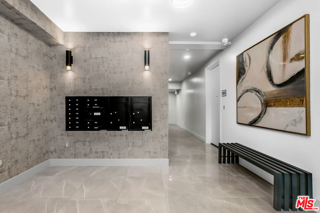 3632 Keystone Avenue, Unit 302 Los Angeles, CA 90034 - Photo 5 of 38 a bathroom with a bathtub and a shower