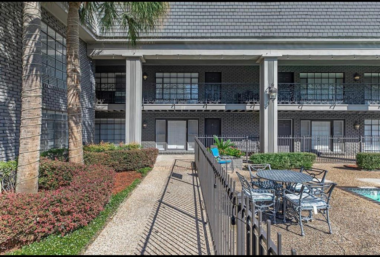 2322 Richton Street, Unit 13 Houston, TX 77098 - Photo 2 of 11 a house view with a seating space and garden space