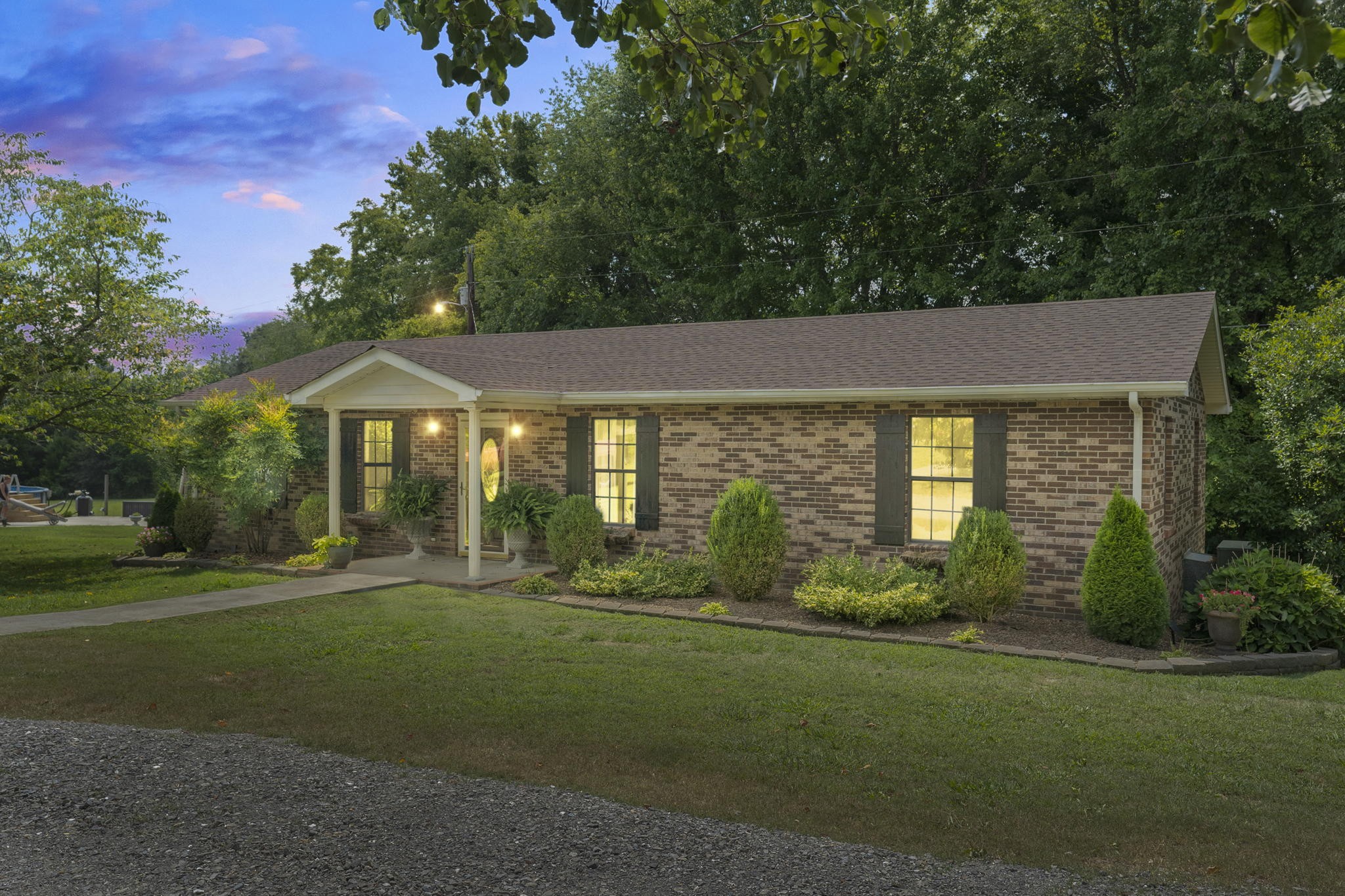 450 Fowler Ford Road Portland, TN 37148 - Photo 1 of 20 a front view of a house with a yard