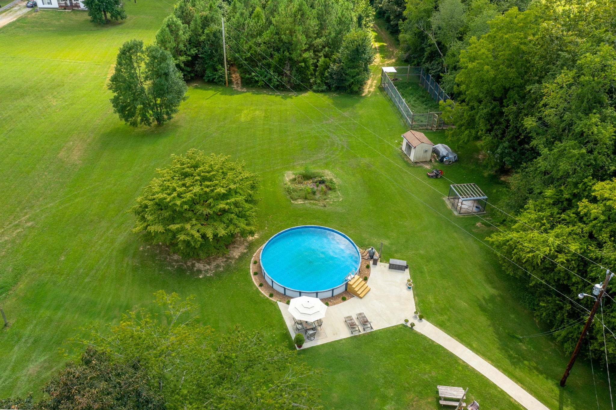 450 Fowler Ford Road Portland, TN 37148 - Photo 18 of 20 a backyard of a house with lots of green space