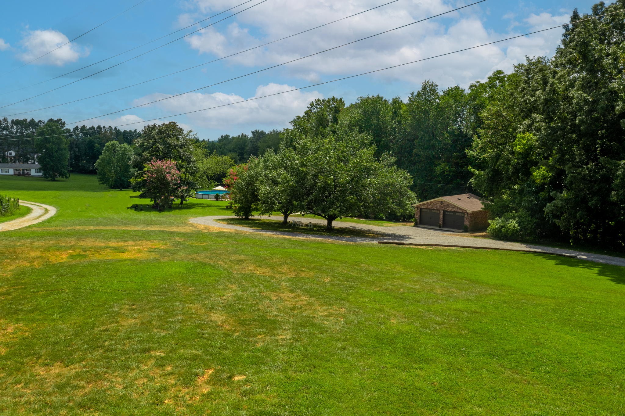 450 Fowler Ford Road Portland, TN 37148 - Photo 4 of 20 a view of a garden and basketball court