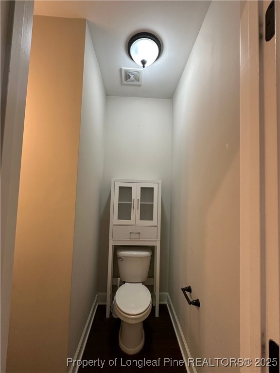 1024 Micahs Way North Spring Lake, NC 28390 - Photo 12 of 43 a bathroom with a toilet and a sink