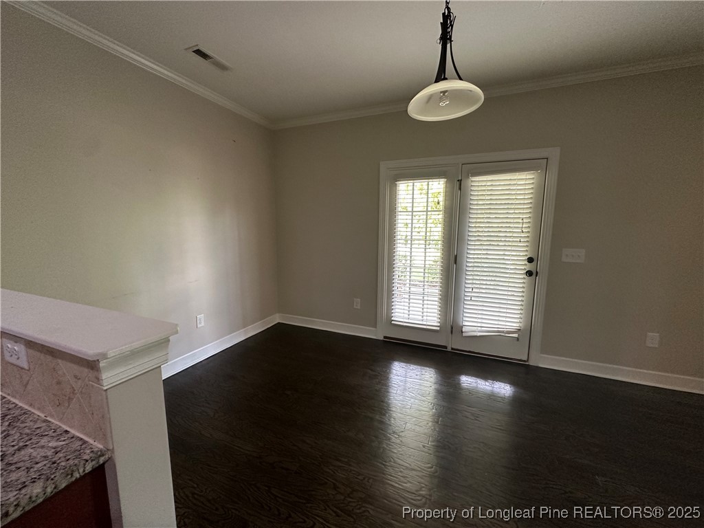 1024 Micahs Way North Spring Lake, NC 28390 - Photo 18 of 43 a view of a livingroom with wooden floor and a window