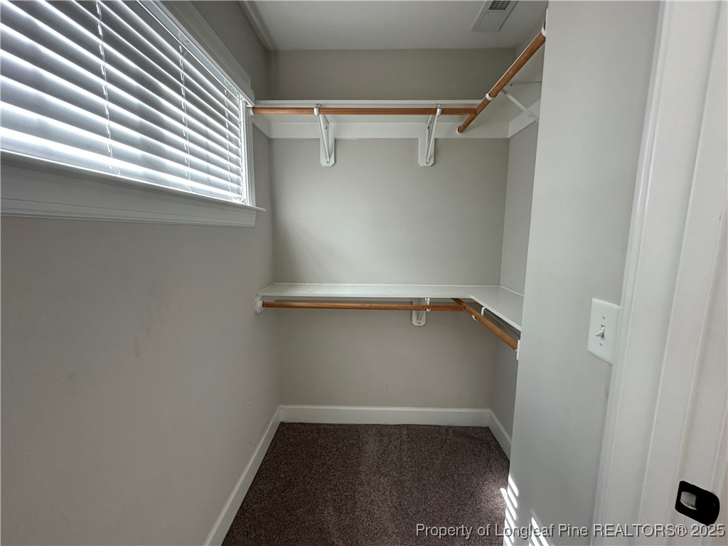 1024 Micahs Way North Spring Lake, NC 28390 - Photo 25 of 43 a view of a room with racks on the wall