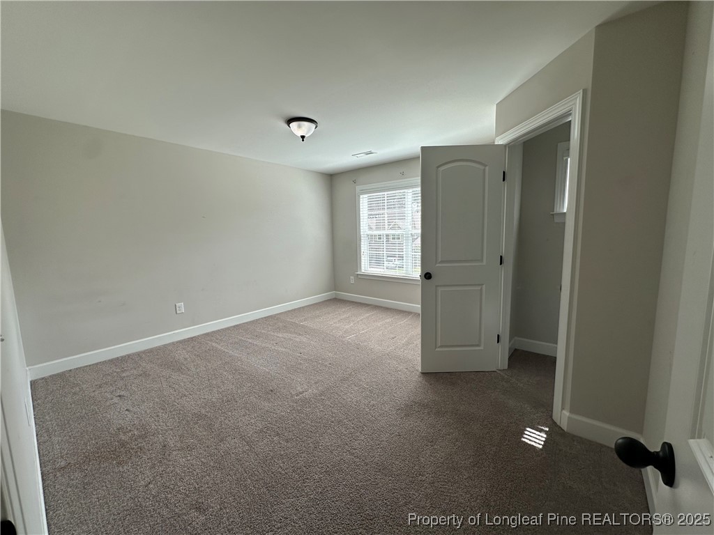 1024 Micahs Way North Spring Lake, NC 28390 - Photo 27 of 43 a view of an empty room