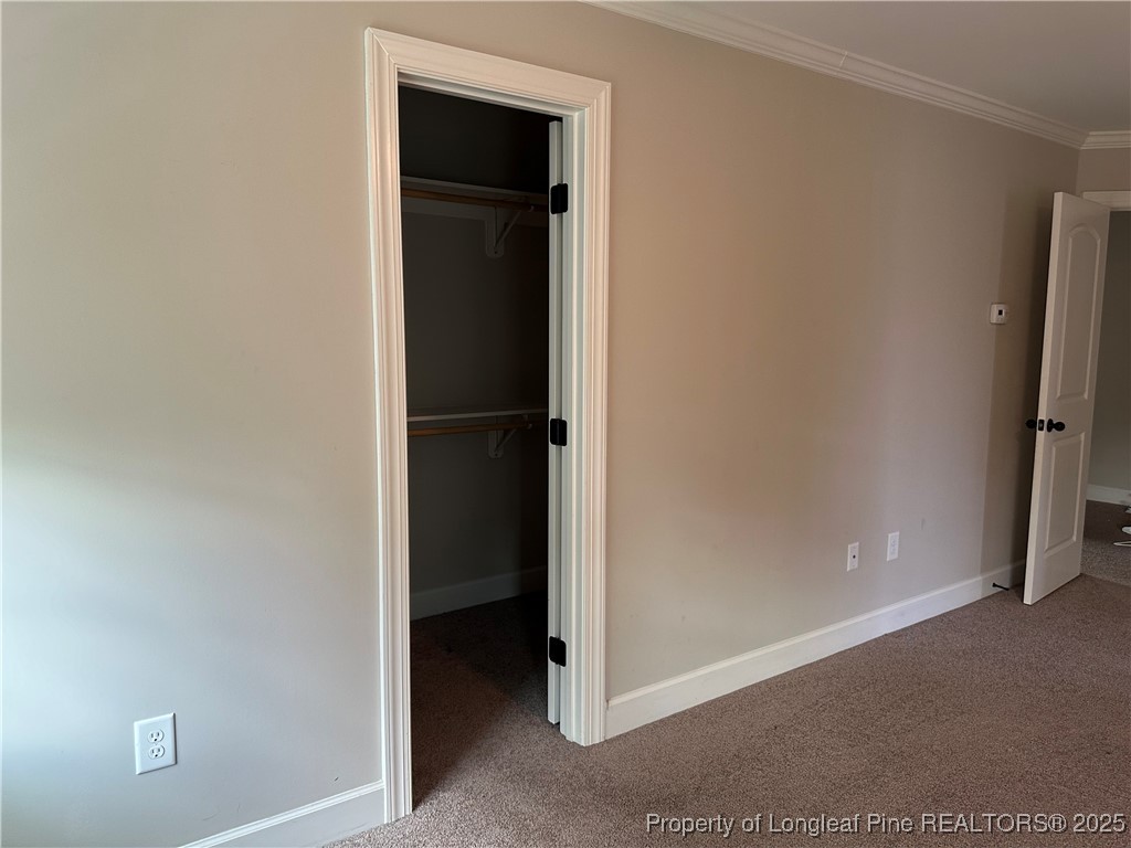 1024 Micahs Way North Spring Lake, NC 28390 - Photo 30 of 43 a view of a closet area with hallway
