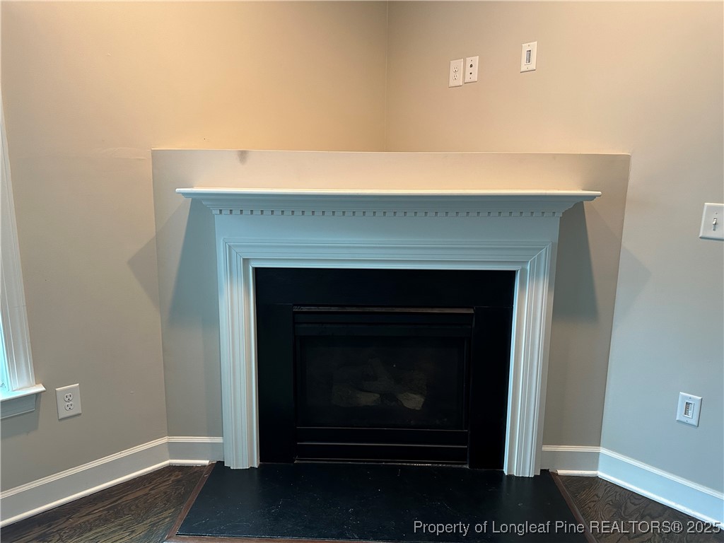 1024 Micahs Way North Spring Lake, NC 28390 - Photo 10 of 43 a room with a fireplace