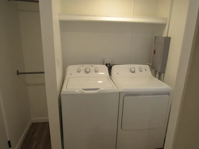 a bathroom with a double vanity sink and mirror