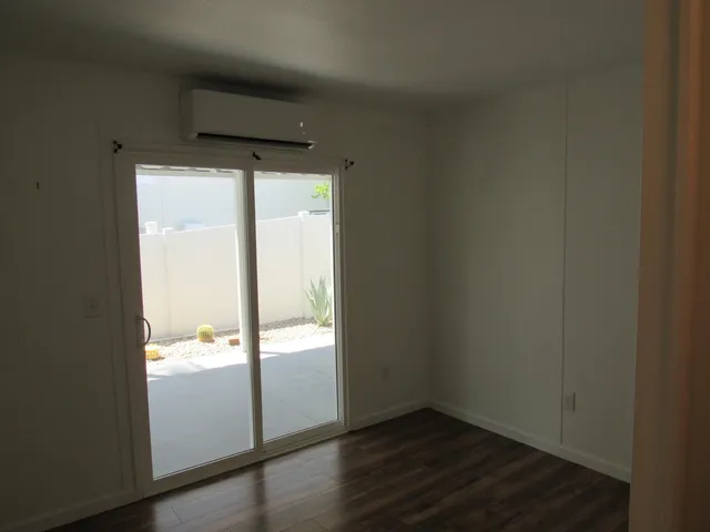 a view of a kitchen from the hallway