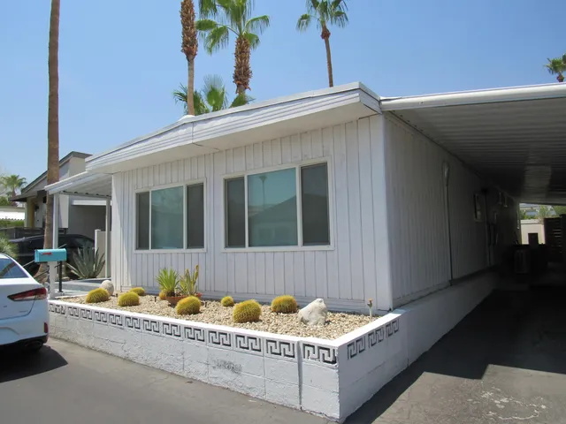 a front view of a house with patio