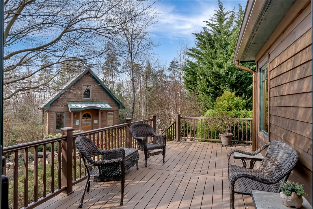 511 Palmer Way Sunset, SC 29685 - Photo 35 of 50 Back Deck overlooking water feature, private back yard and path to Guest House