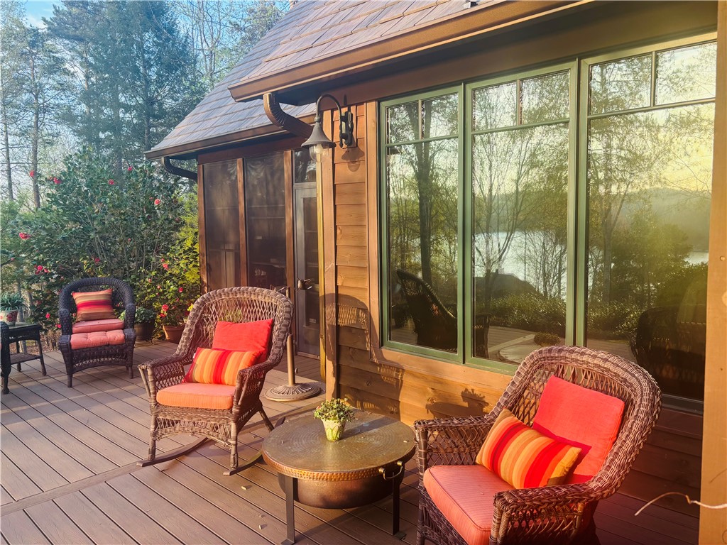 511 Palmer Way Sunset, SC 29685 - Photo 4 of 50 Front deck with seasonal water views and sunrise views