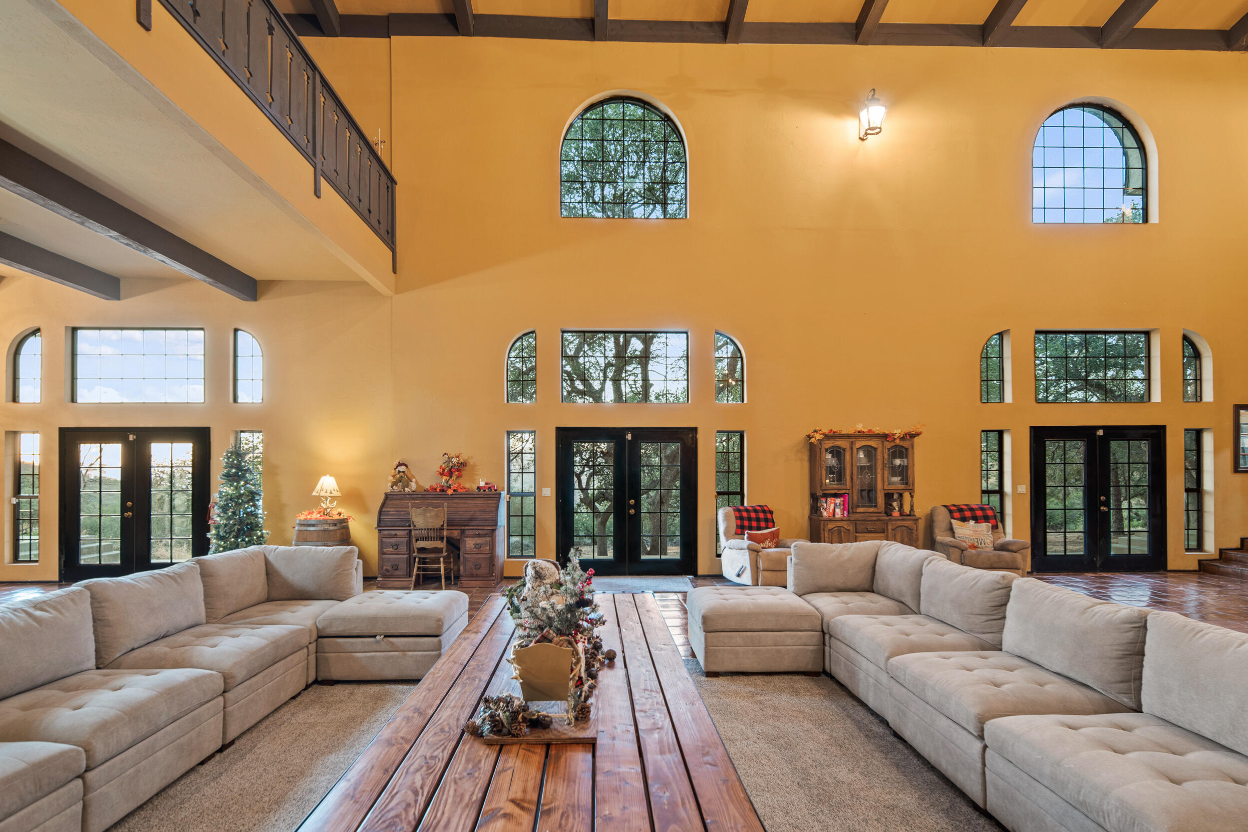 20718 Darsy Road Tehachapi, CA 93561 - Photo 12 of 64 a living room with furniture fireplace and a large window
