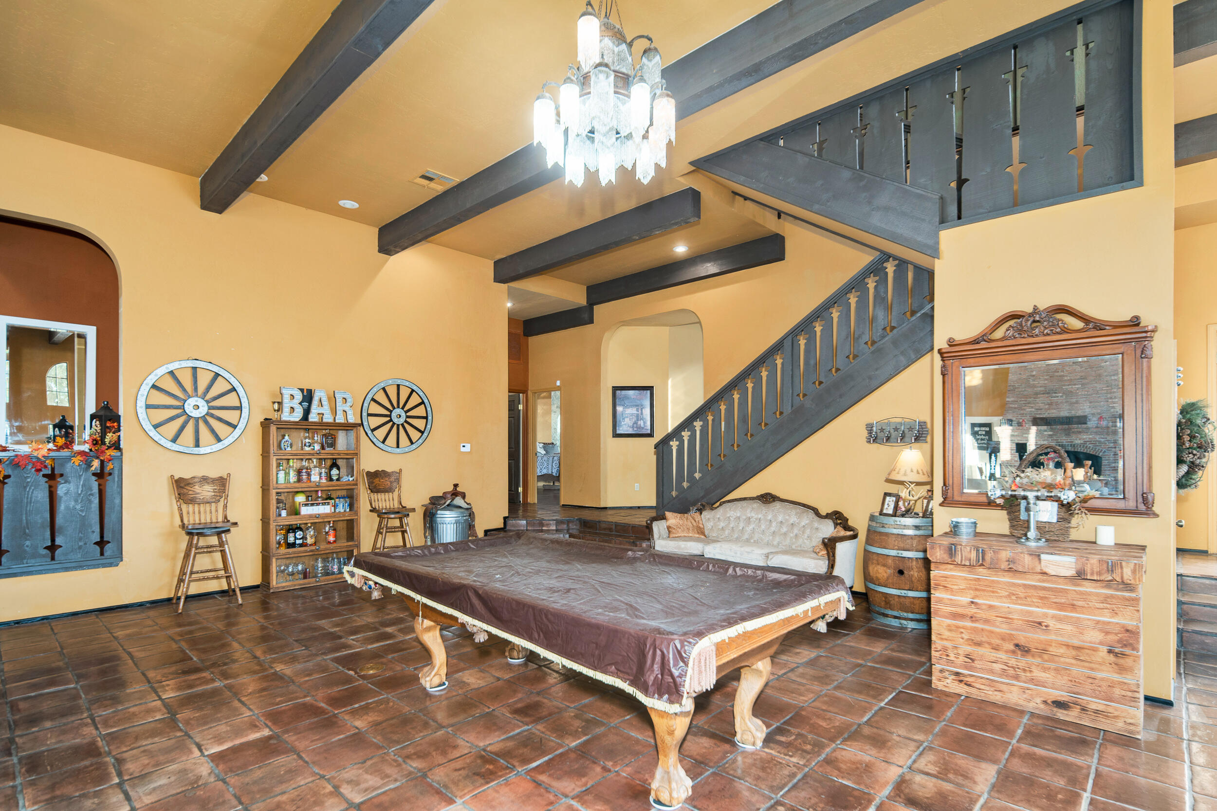 20718 Darsy Road Tehachapi, CA 93561 - Photo 16 of 64 a living room with furniture a table and chairs