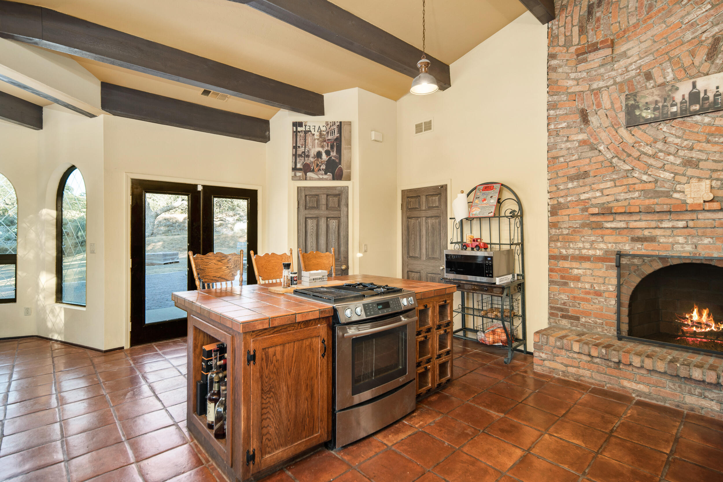 20718 Darsy Road Tehachapi, CA 93561 - Photo 19 of 64 a view of a livingroom with furniture and a fireplace