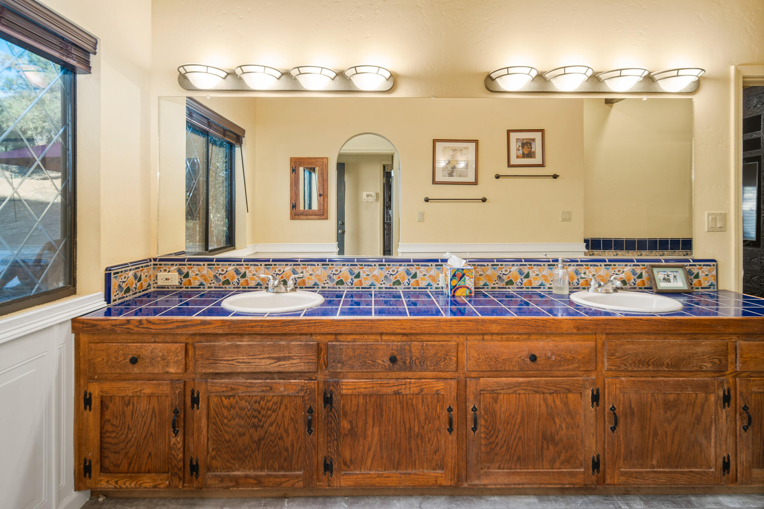 20718 Darsy Road Tehachapi, CA 93561 - Photo 29 of 64 a bathroom with a sink and a mirror