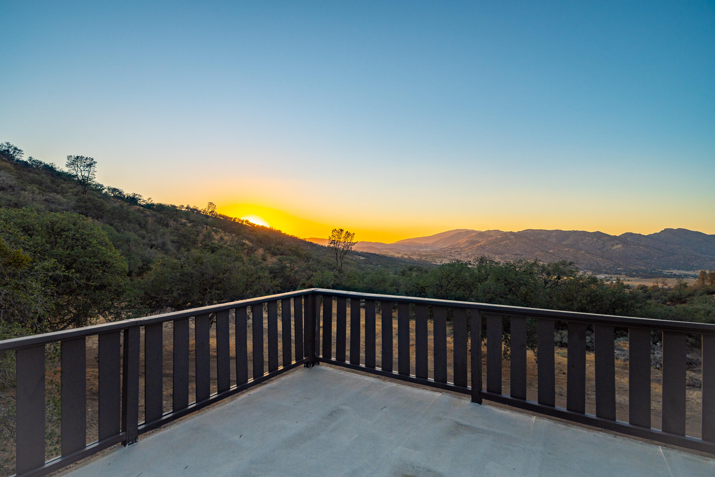 20718 Darsy Road Tehachapi, CA 93561 - Photo 43 of 64 a view of a balcony with wooden fence