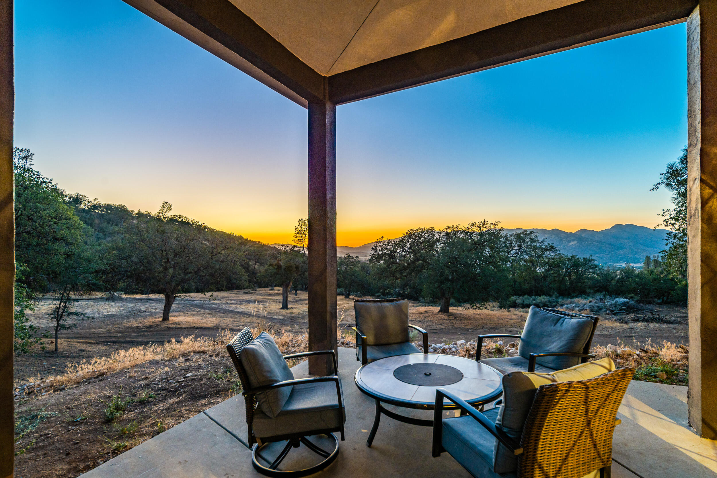 20718 Darsy Road Tehachapi, CA 93561 - Photo 48 of 64 a view of a chairs and table in patio
