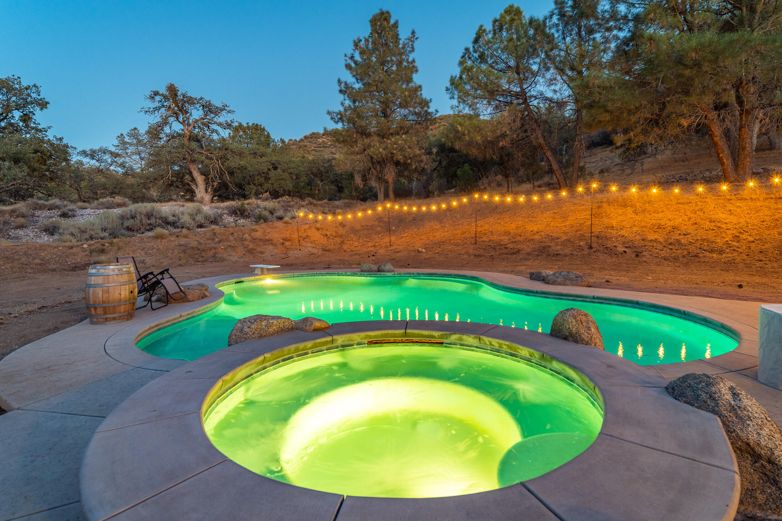 20718 Darsy Road Tehachapi, CA 93561 - Photo 51 of 64 an aerial view of a house with a swimming pool outdoor seating and yard