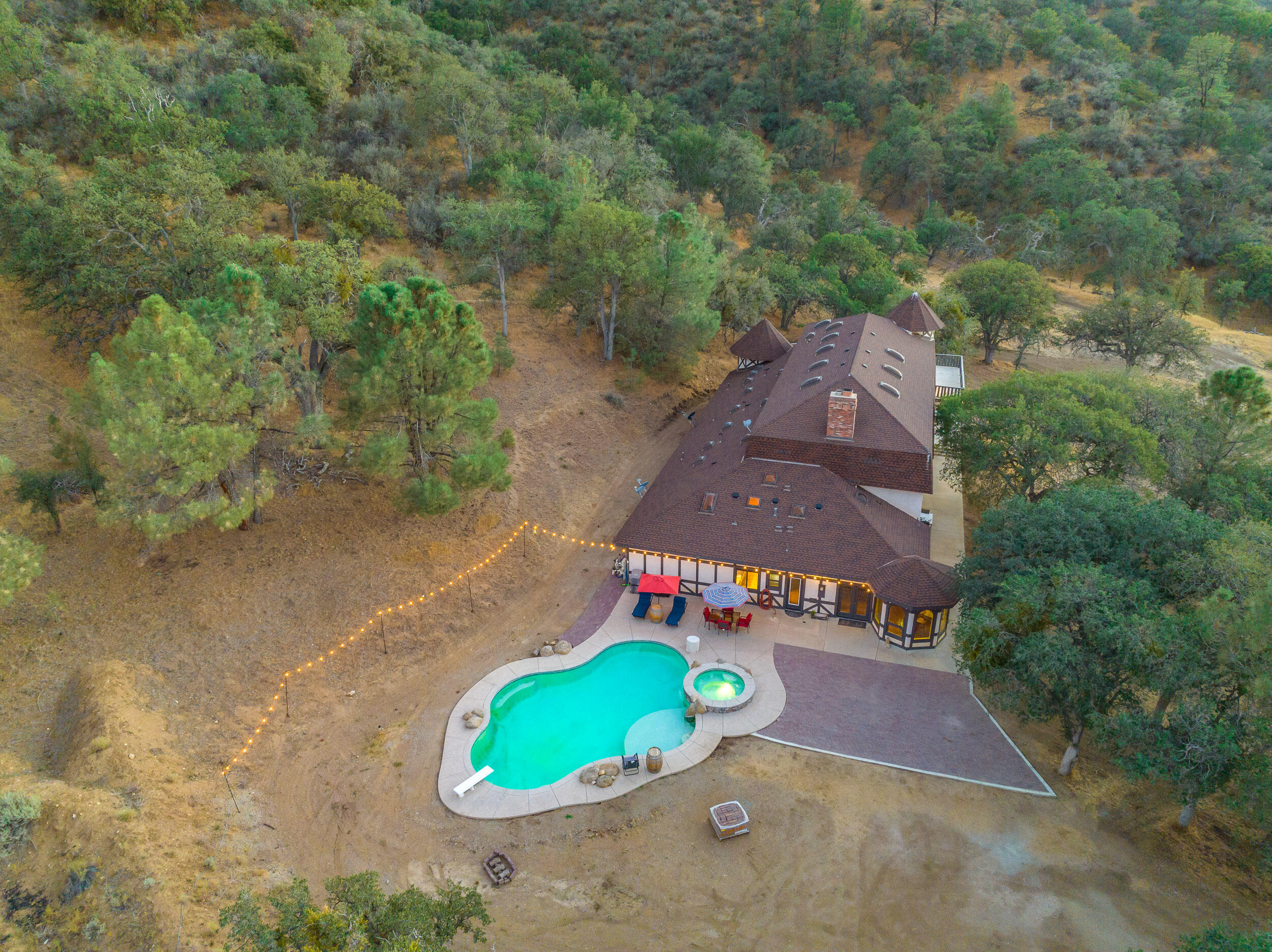 20718 Darsy Road Tehachapi, CA 93561 - Photo 56 of 64 an aerial view of a house with a swimming pool