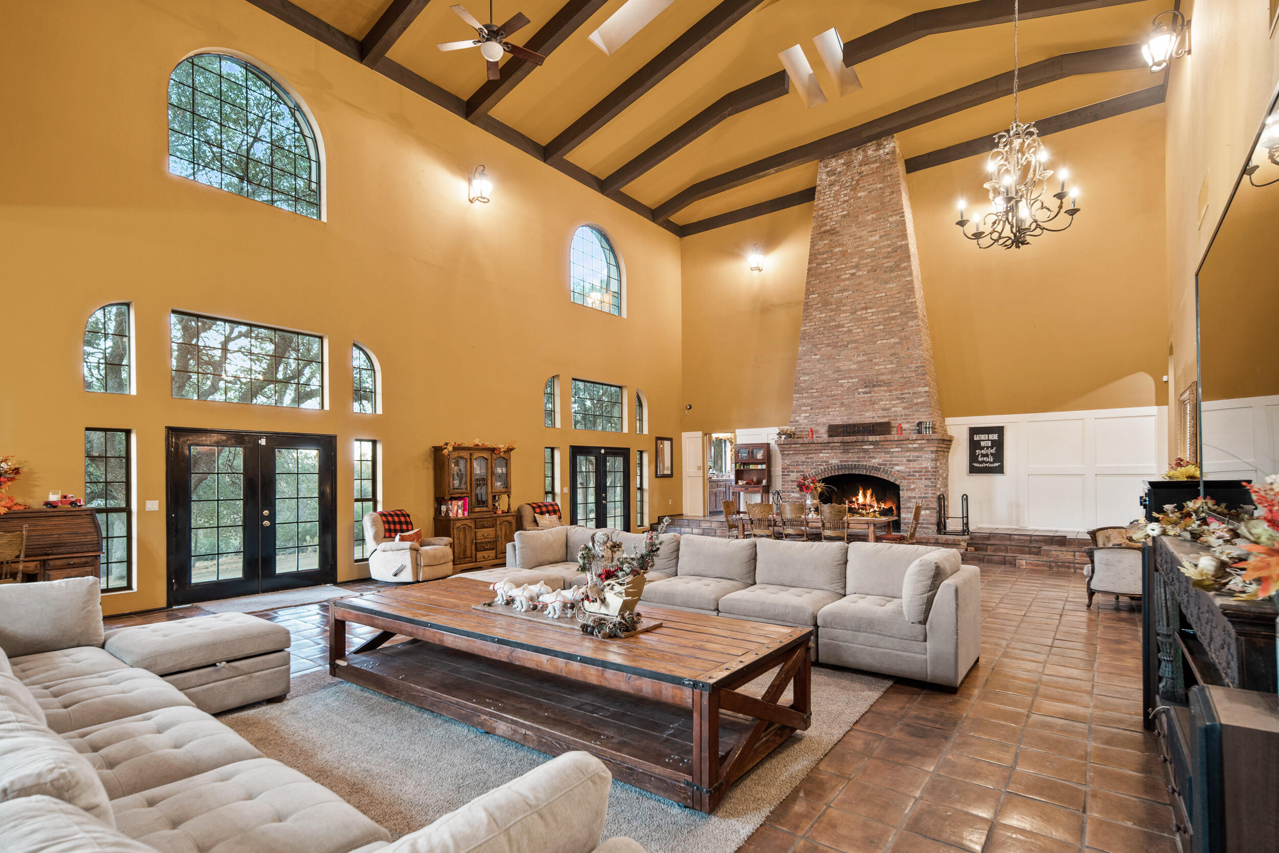 20718 Darsy Road Tehachapi, CA 93561 - Photo 8 of 64 a living room with fireplace furniture and a large window