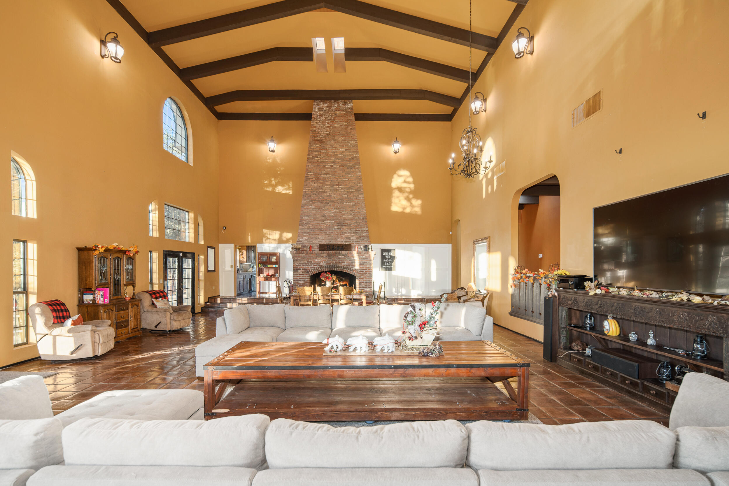 20718 Darsy Road Tehachapi, CA 93561 - Photo 9 of 64 a living room with fireplace furniture and a flat screen tv