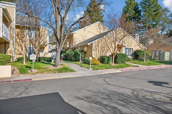 a view of a house with a park