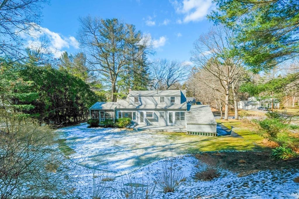 53 Moore Road Wayland, MA 01778 - Photo 1 of 27 a view of a house with swimming pool and sitting area