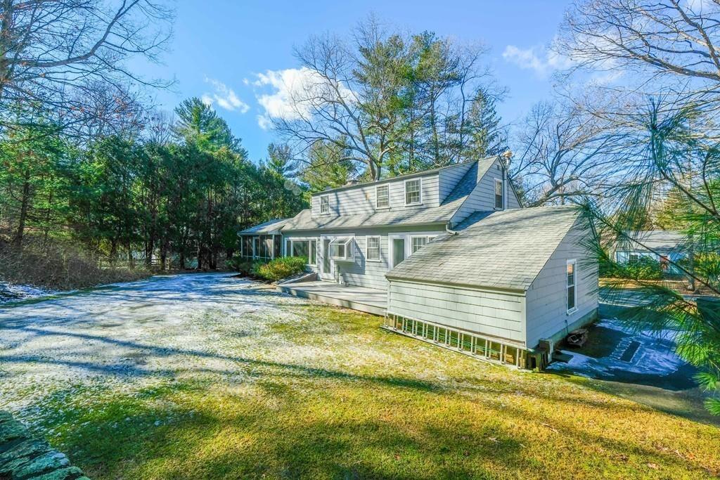 53 Moore Road Wayland, MA 01778 - Photo 24 of 27 a view of a house with pool and sitting area