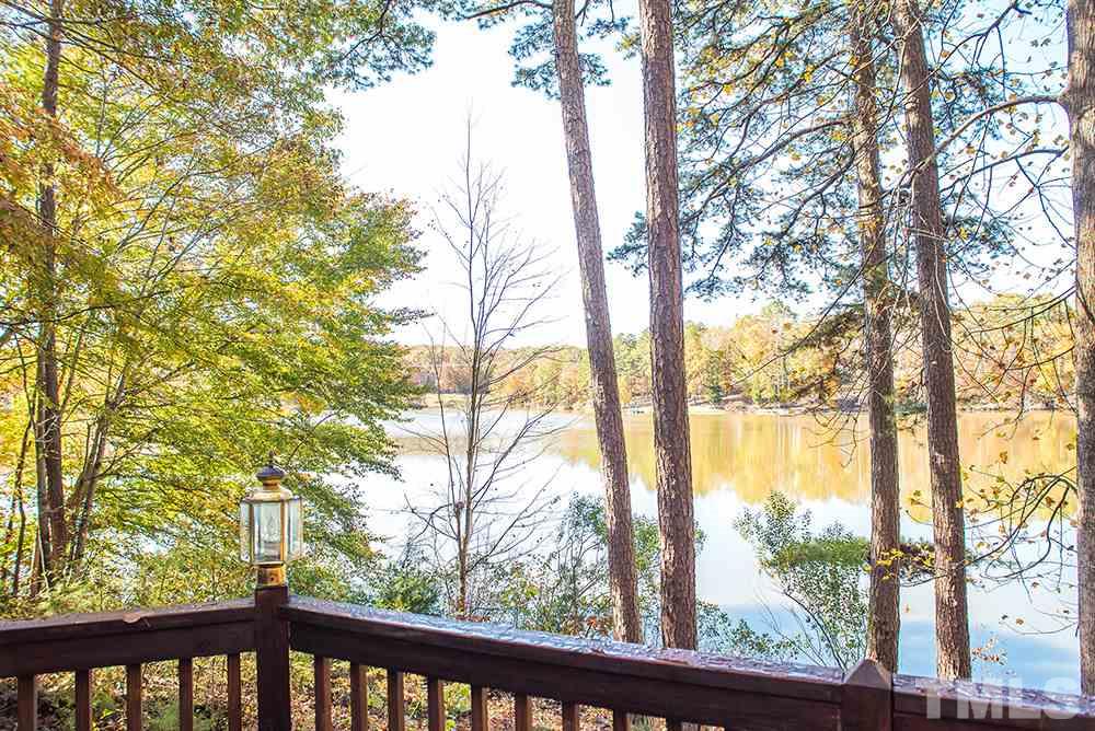 313 Fishermans Point Road Roxboro, NC 27574 - Photo 8 of 25 a view of mountain view with sitting in trees