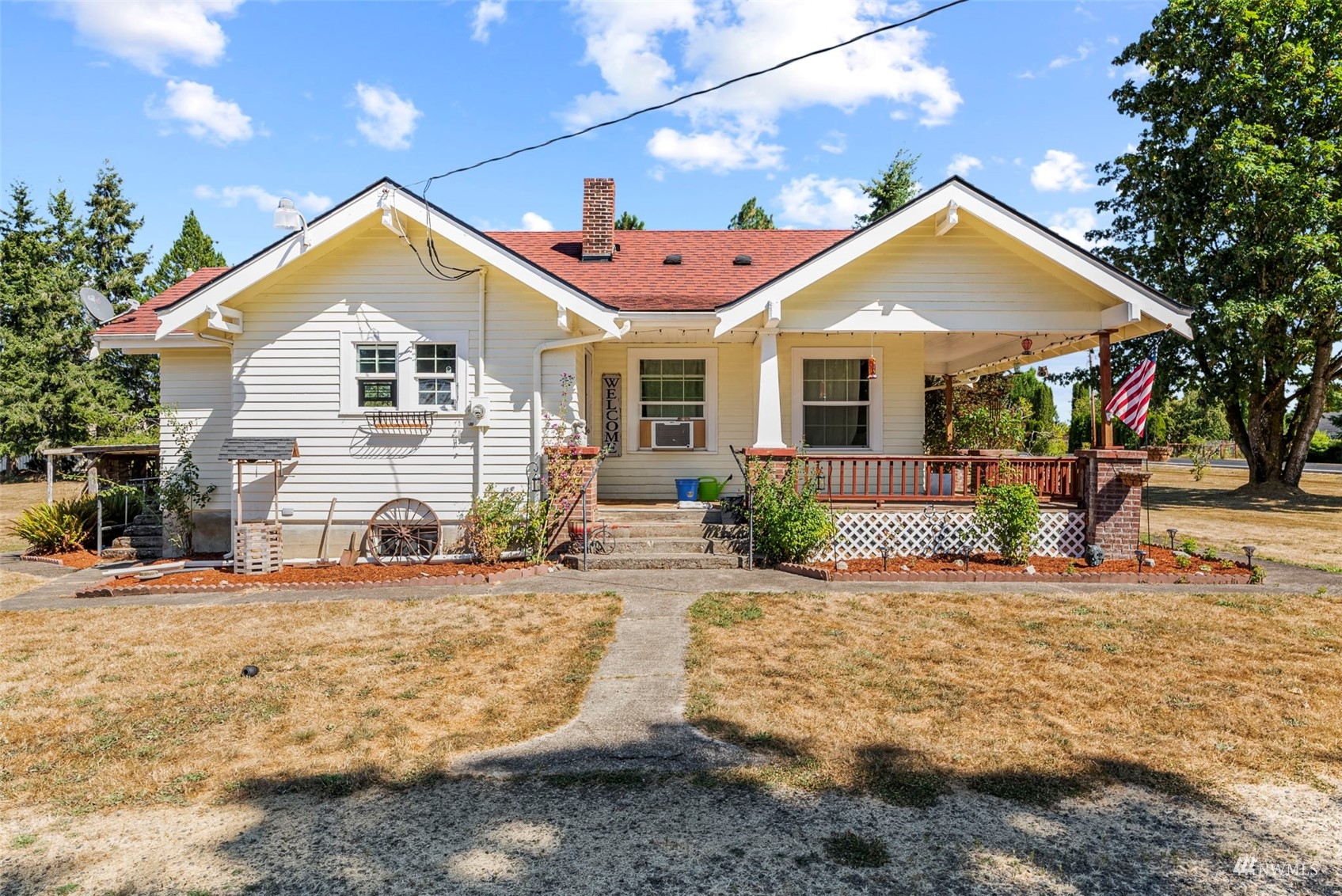 713 Nevil Road Winlock, WA 98596 - Photo 1 of 31 a front view of a house with a yard