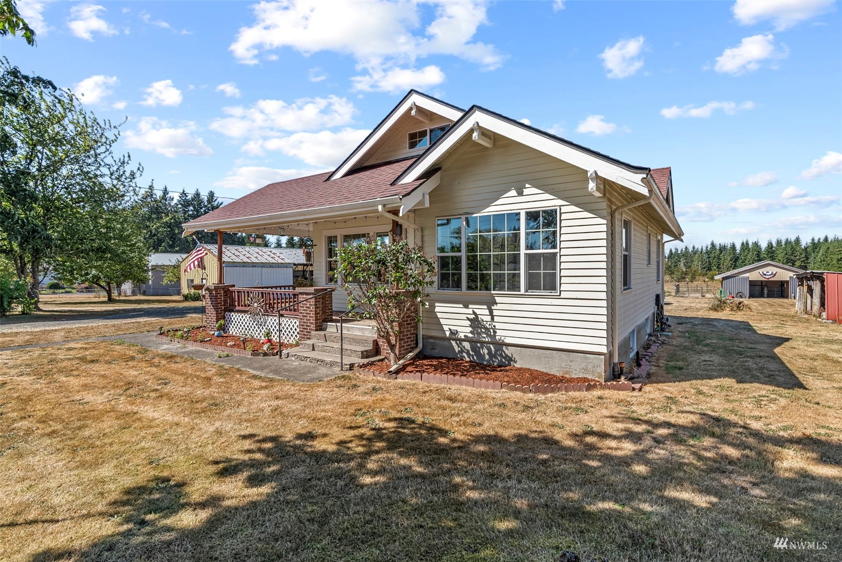 713 Nevil Road Winlock, WA 98596 - Photo 5 of 31 a view of a house with a yard