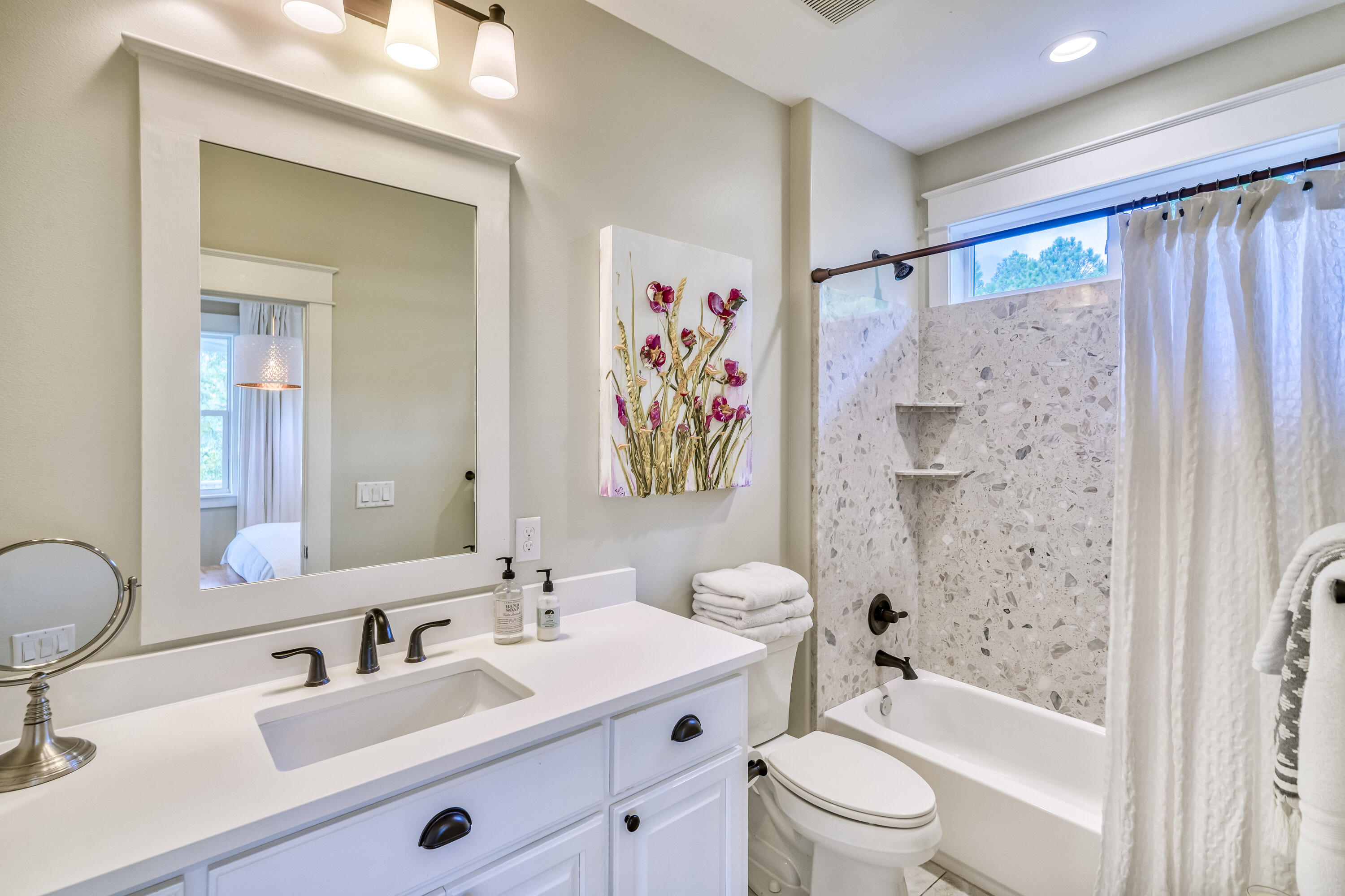 100 Snapper Street Santa Rosa Beach, FL 32459 - Photo 15 of 35 a bathroom with a sink a toilet and shower