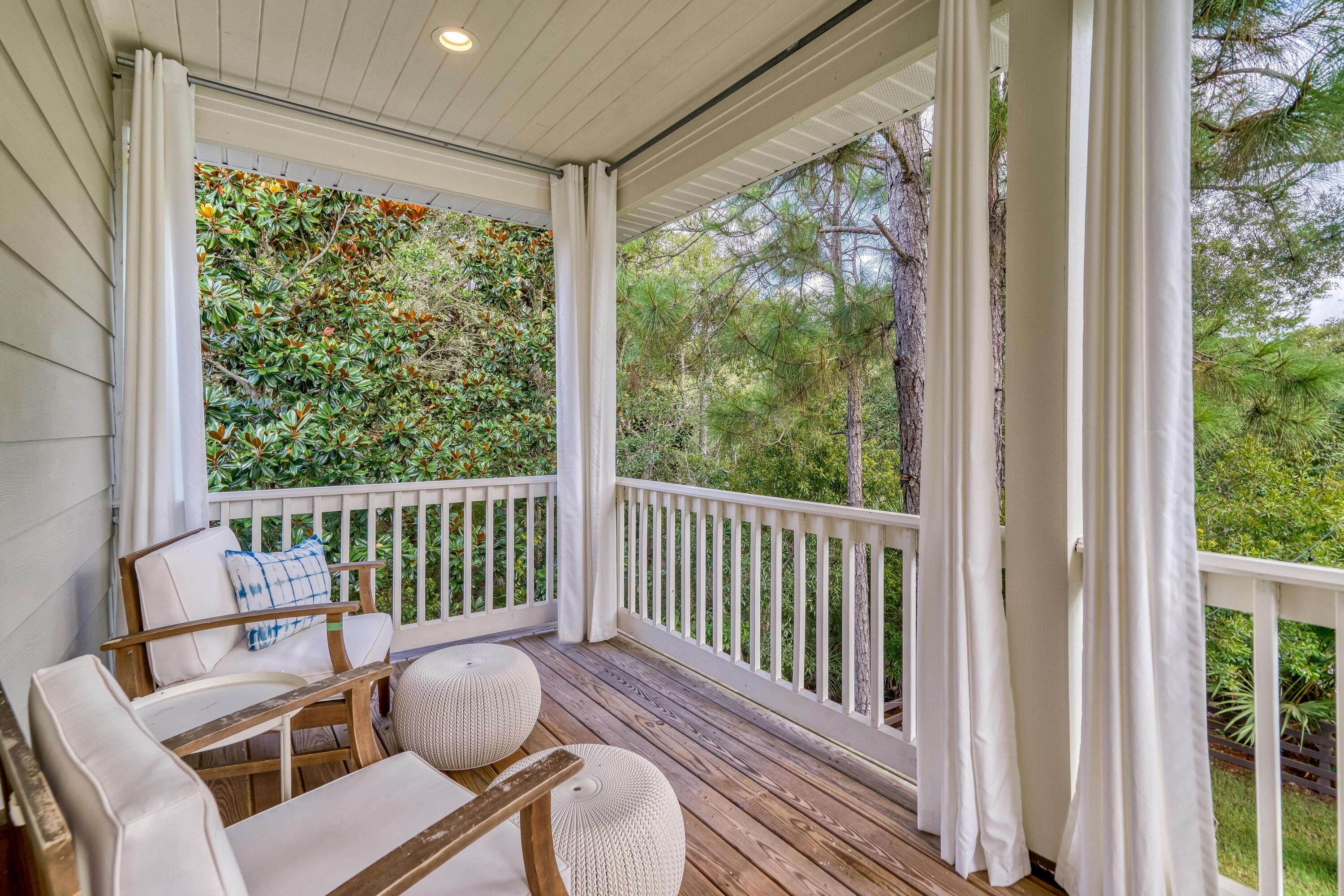 100 Snapper Street Santa Rosa Beach, FL 32459 - Photo 16 of 35 a view of a chair and table in the balcony