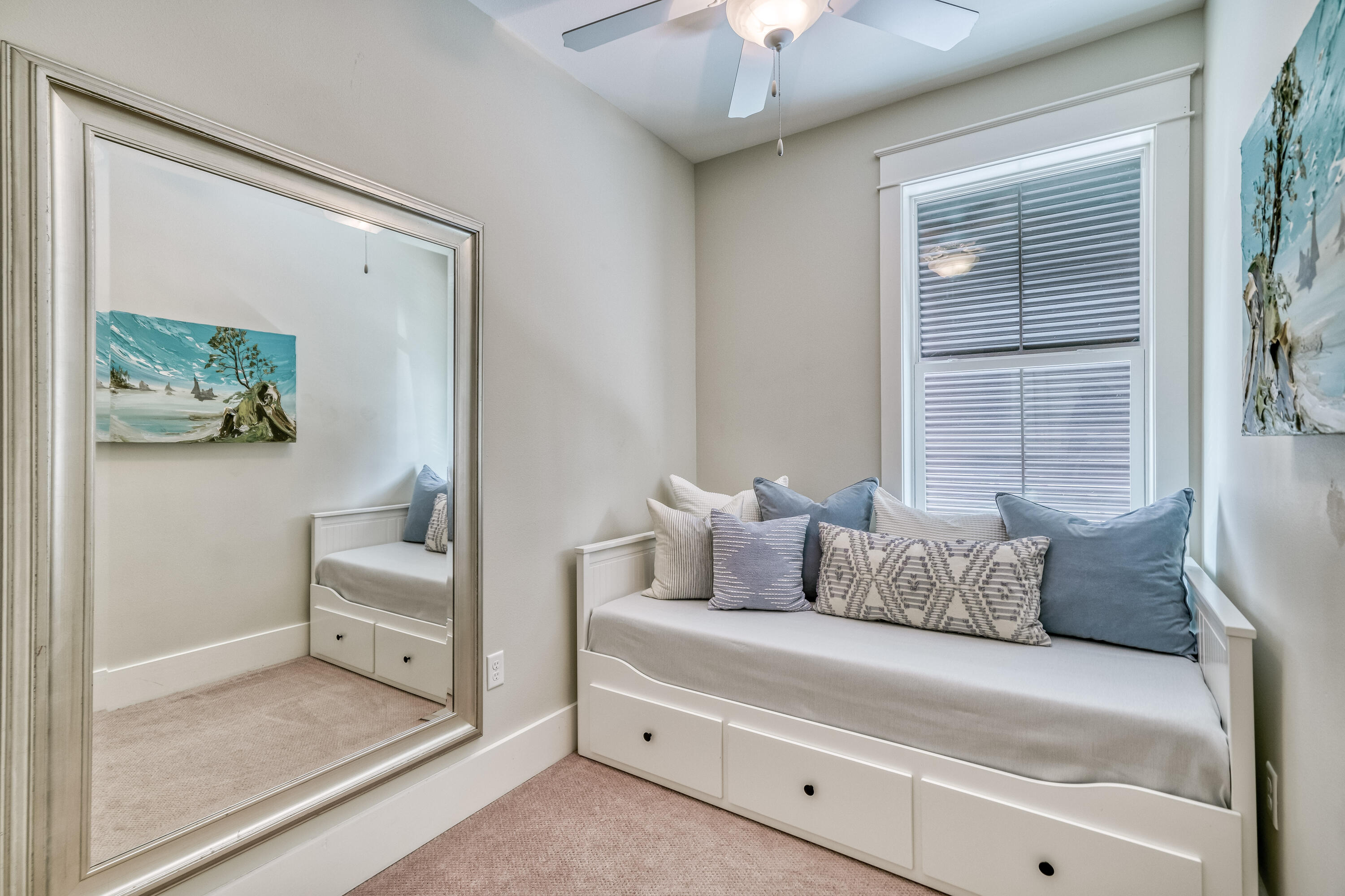 100 Snapper Street Santa Rosa Beach, FL 32459 - Photo 19 of 35 a bedroom with a bed and a chandelier