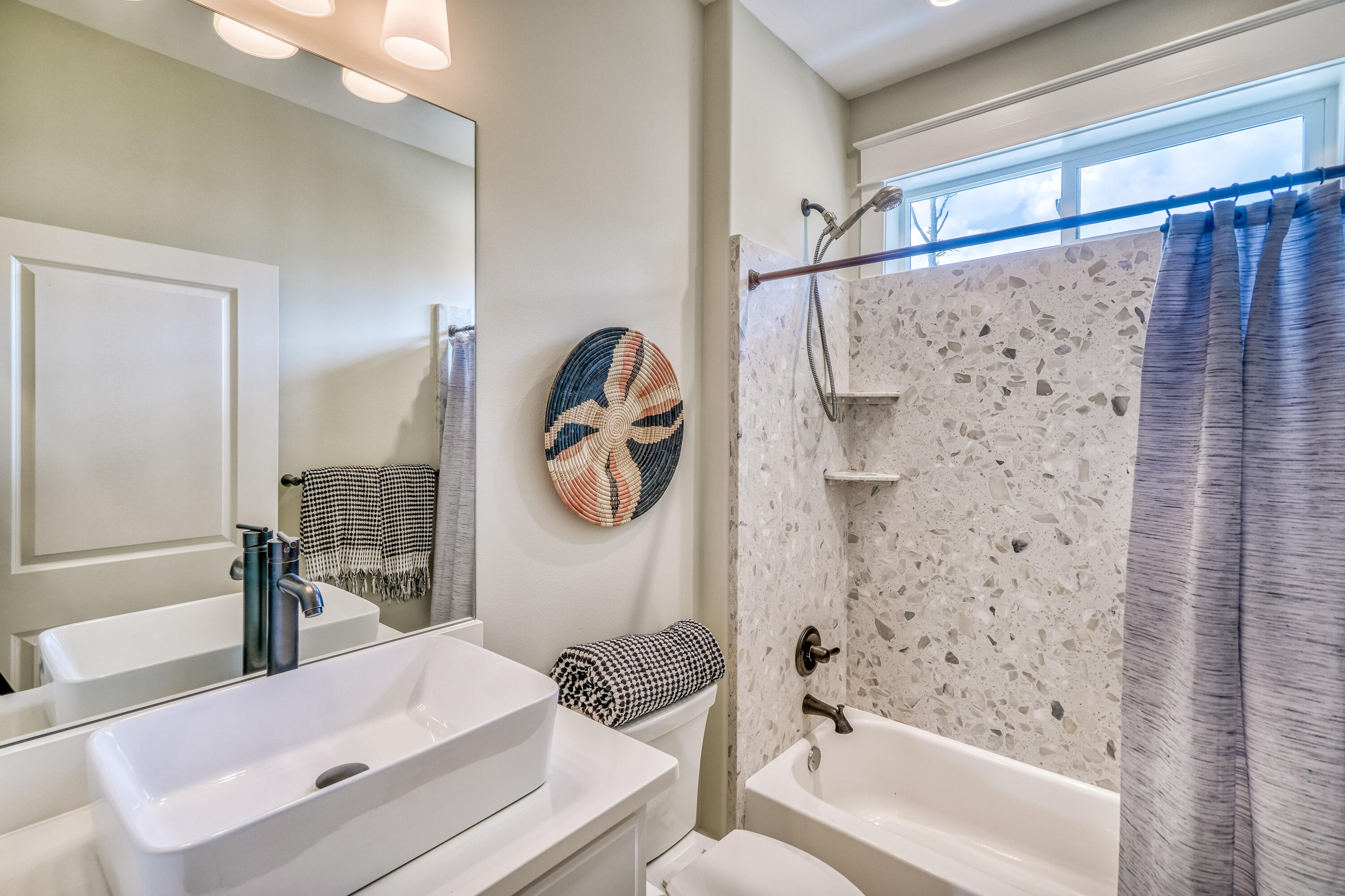 100 Snapper Street Santa Rosa Beach, FL 32459 - Photo 21 of 35 a bathroom with a bathtub and a shower