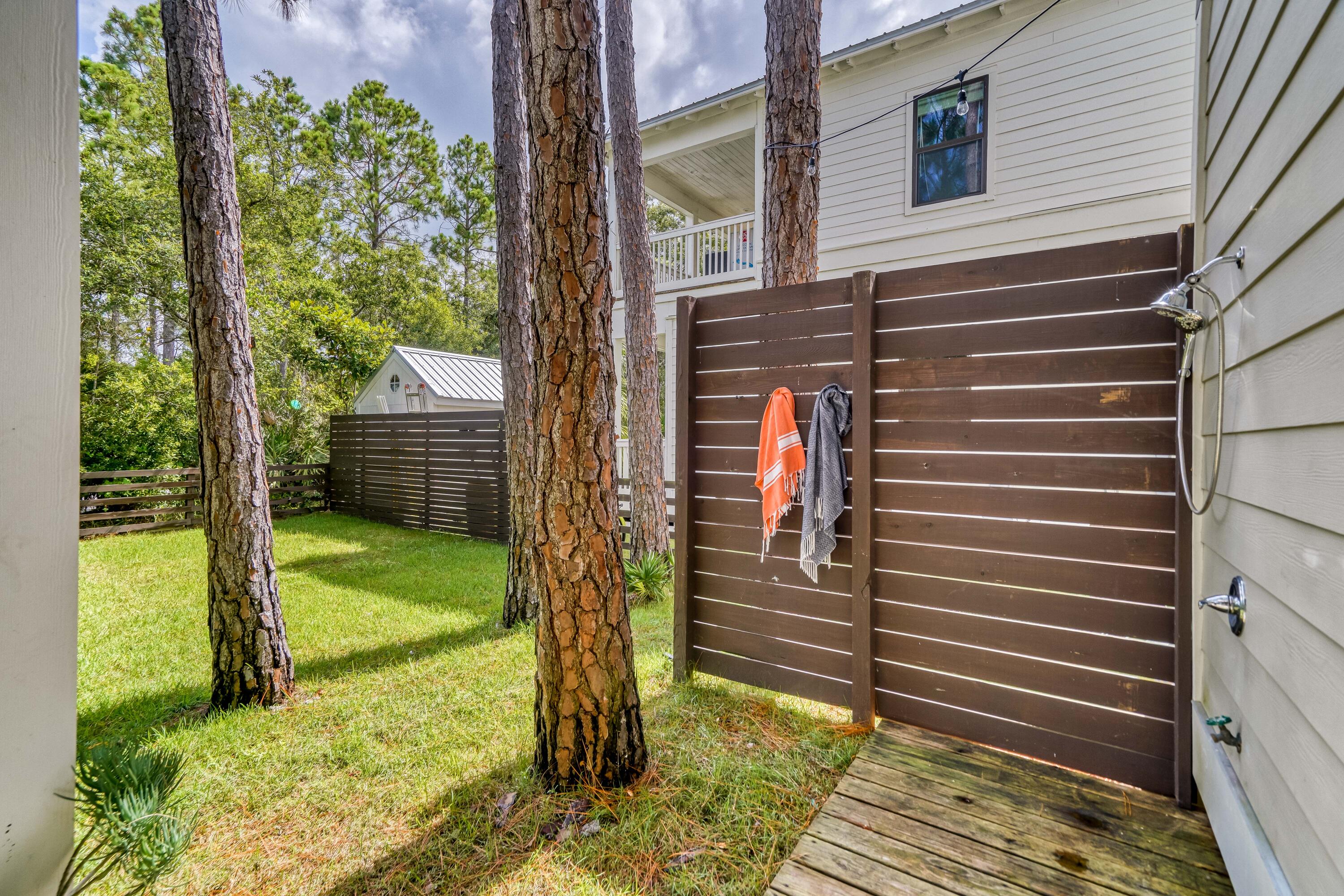 100 Snapper Street Santa Rosa Beach, FL 32459 - Photo 25 of 35 a view of a backyard with pathway