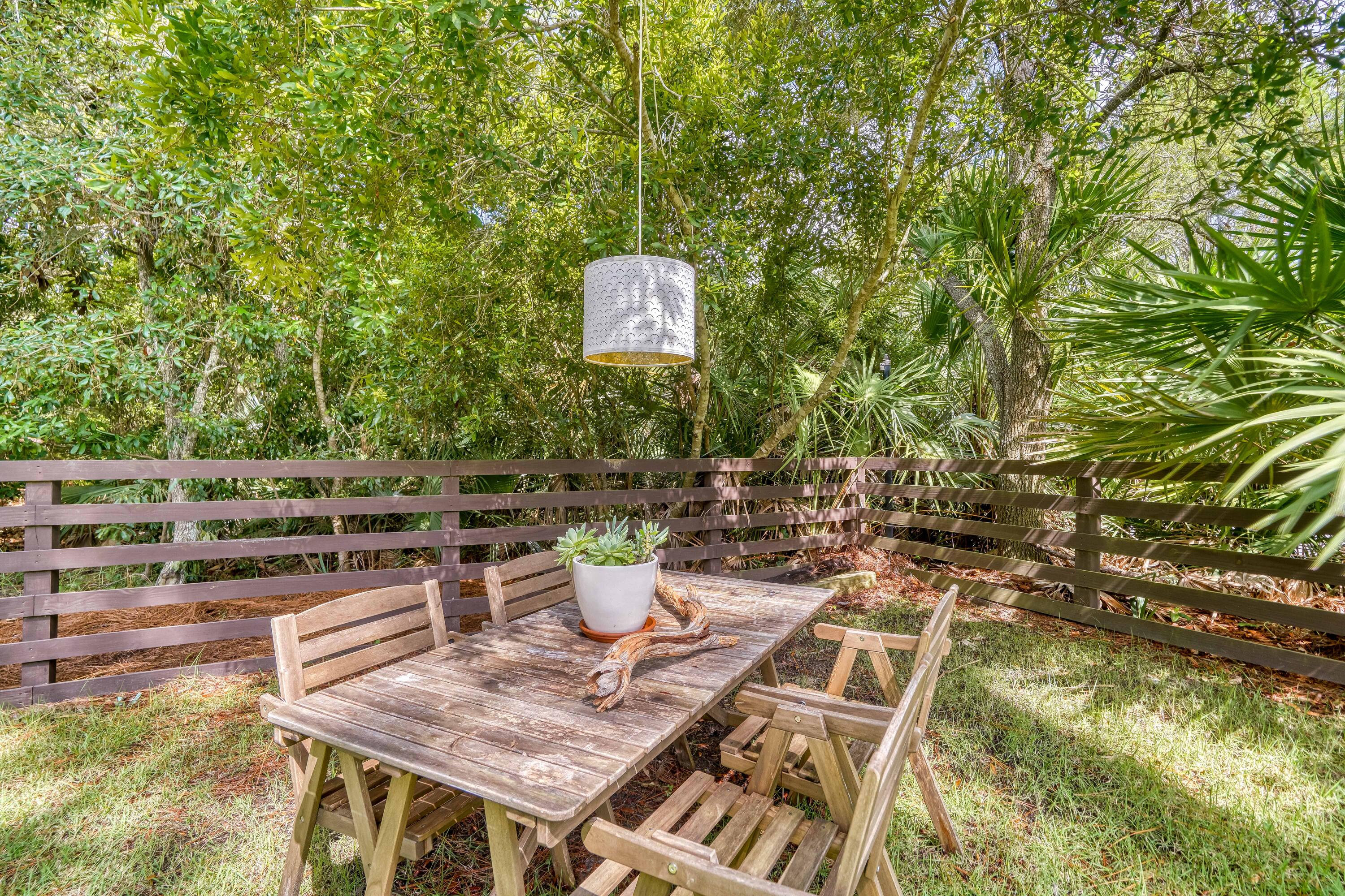 100 Snapper Street Santa Rosa Beach, FL 32459 - Photo 26 of 35 a view of a backyard with sitting area